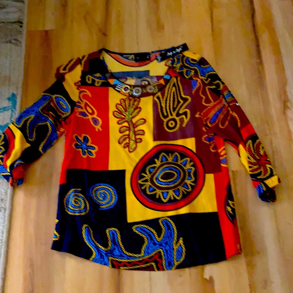 Brand new ladies colorful tunic top.